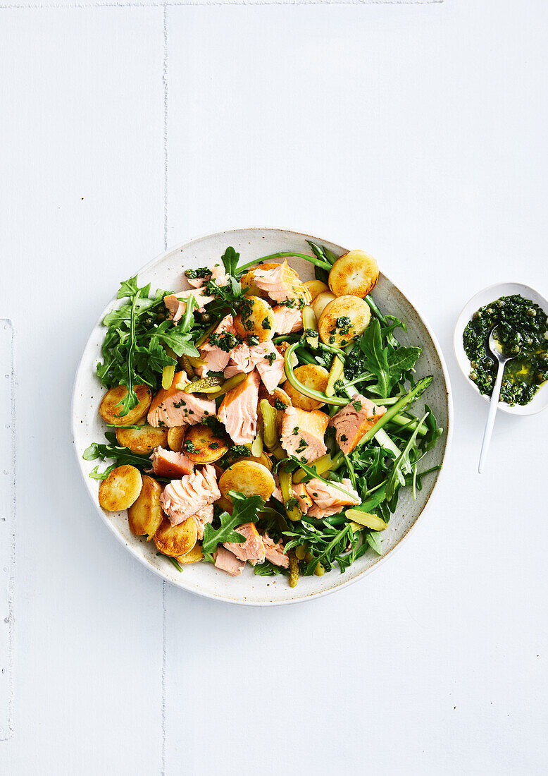 Crispy potato and salmon salad with rocket salad