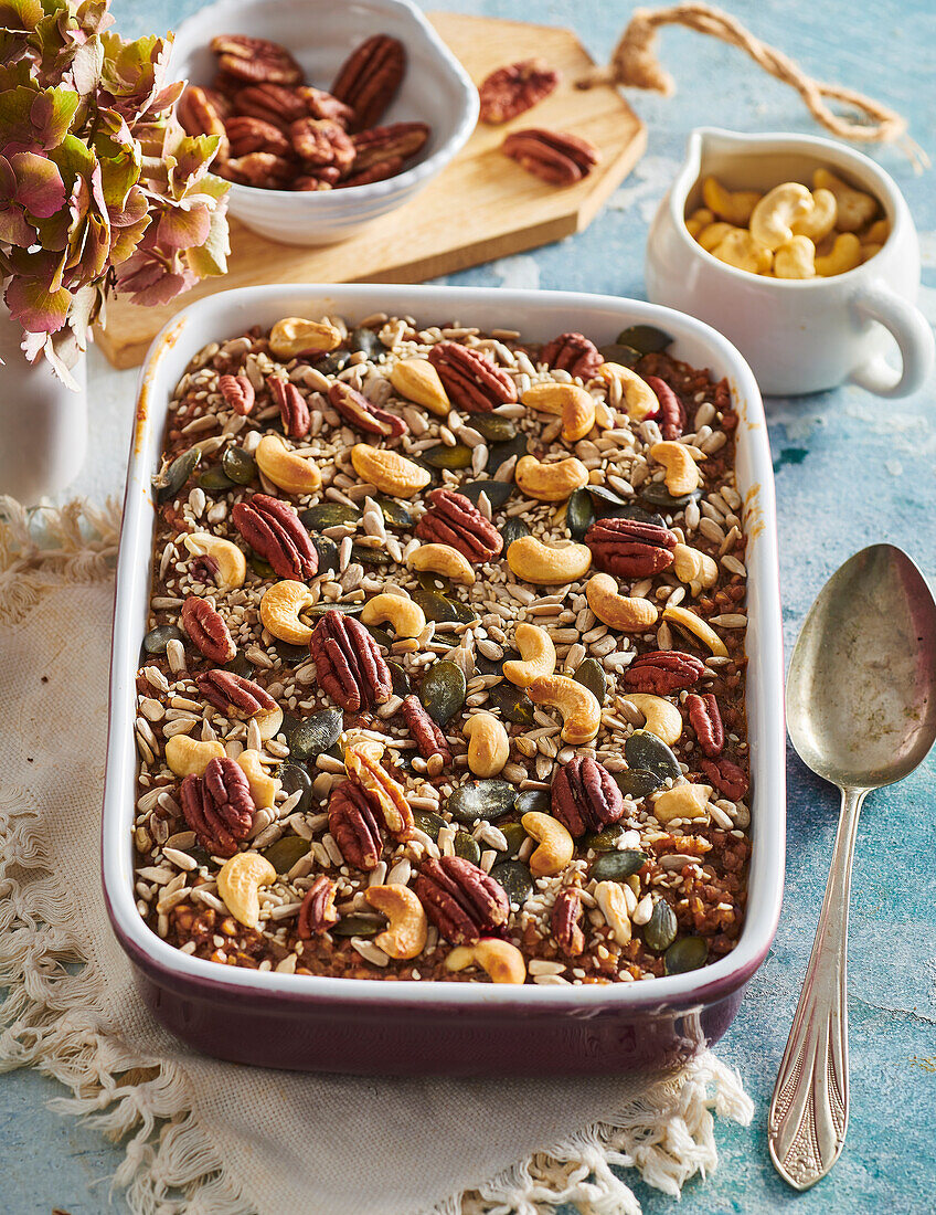 Baked buckwheat pudding with fruit, seeds and nuts
