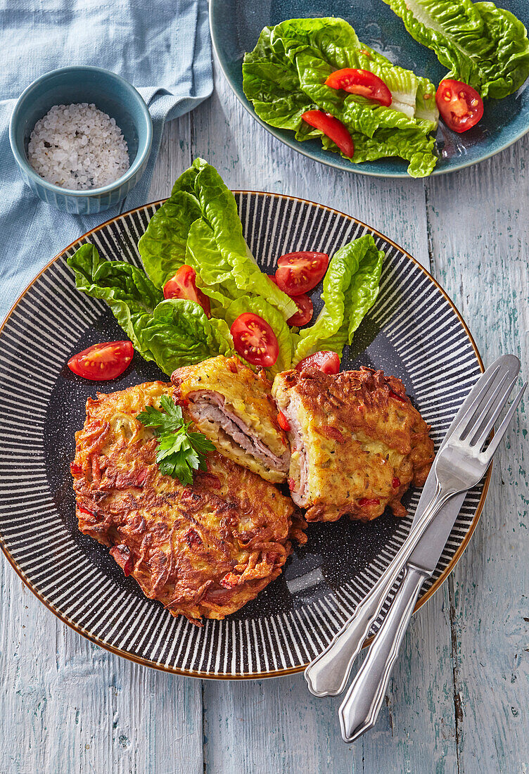 Fried pork cutlet in potato pancake