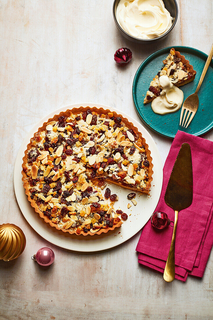 Christmas tart with dried fruit, marzipan and almonds