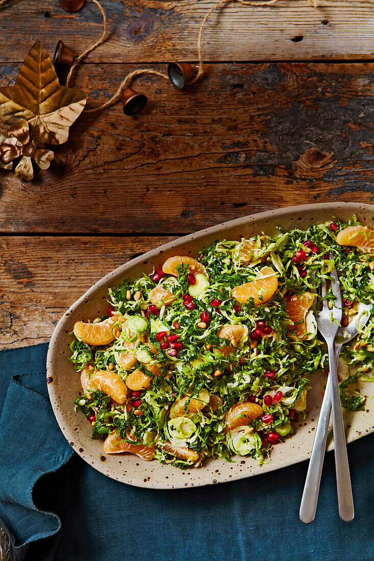 Winter Brussels sprout salad with clementines and pomegranate dressing