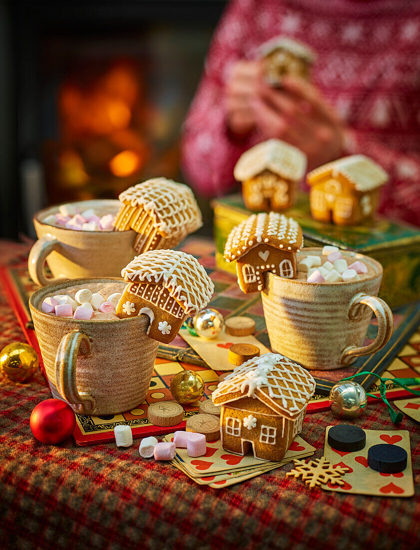 Mini gingerbread houses as mug toppers