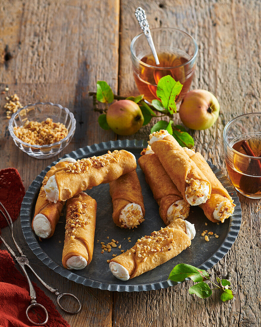 Sweet cannoli with caramelised apples and nuts