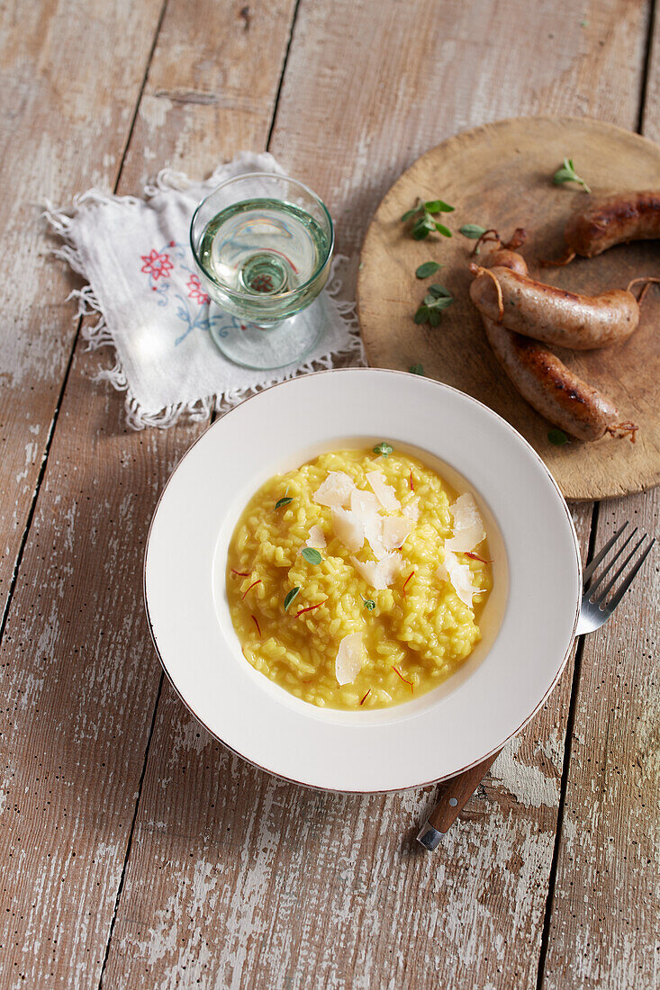 Saffron risotto with luganighe and parmesan