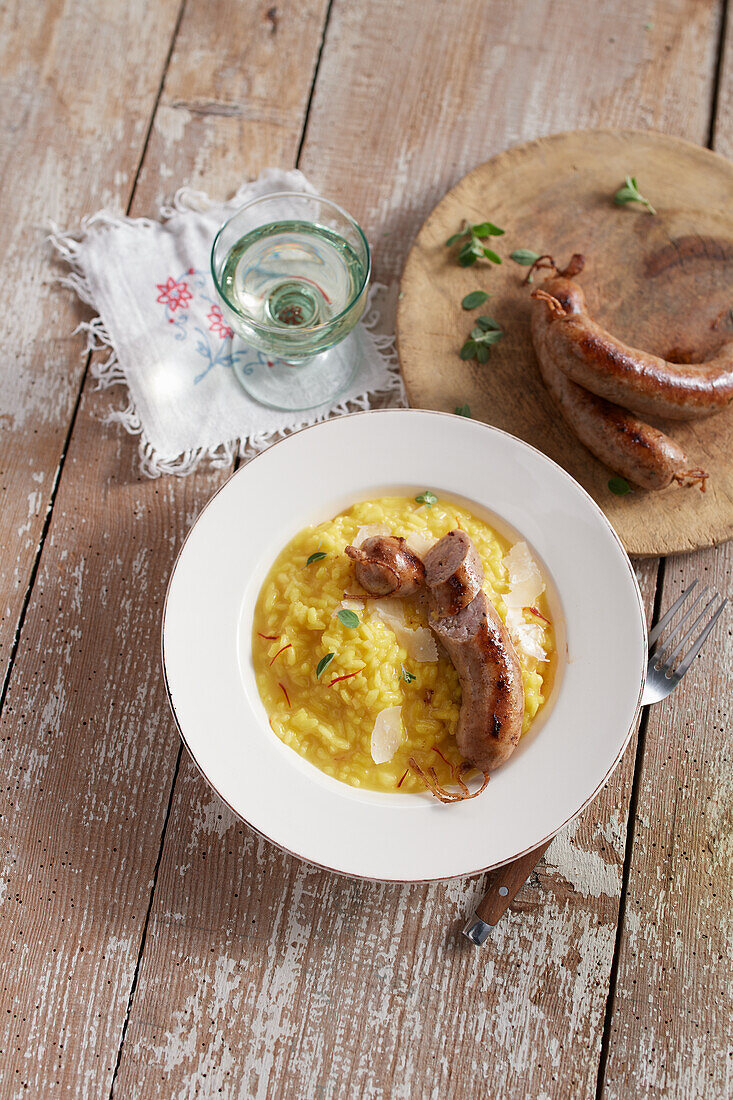 Saffron risotto with luganighe and parmesan