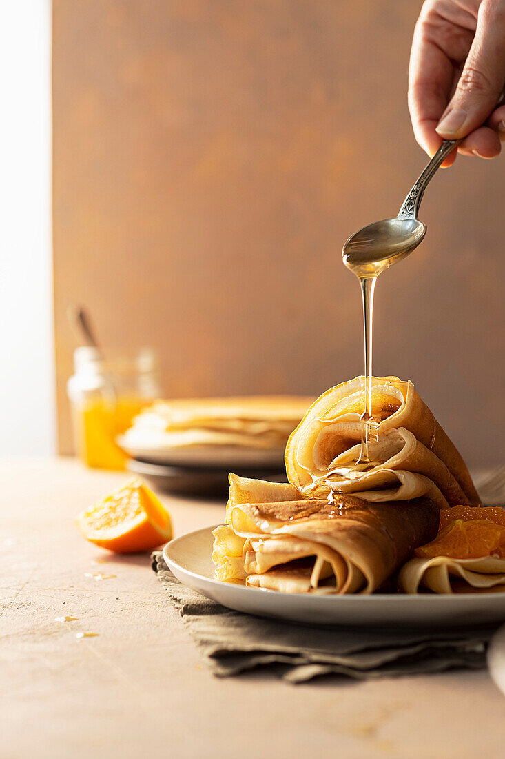 Pancakes drizzled with honey