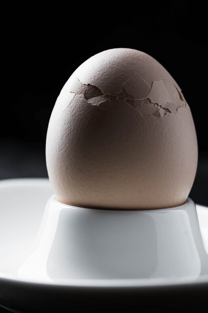 Boiled egg with damaged shell