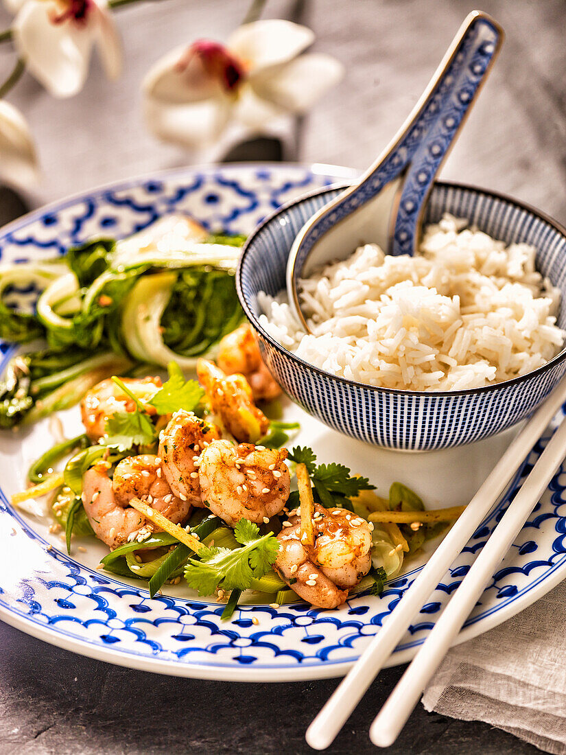 Sesame prawns with ginger and leek served with rice