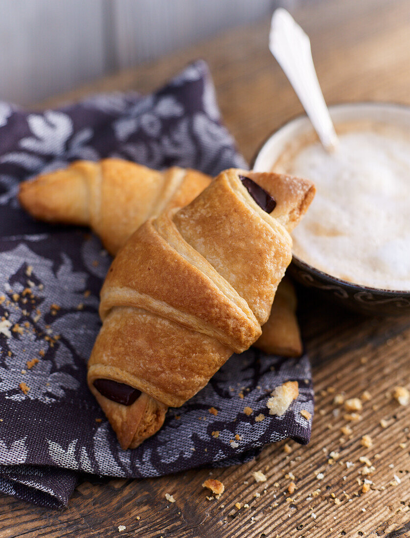 Chocolate croissants with latte