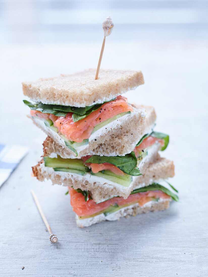 Club sandwich with smoked salmon and cucumber