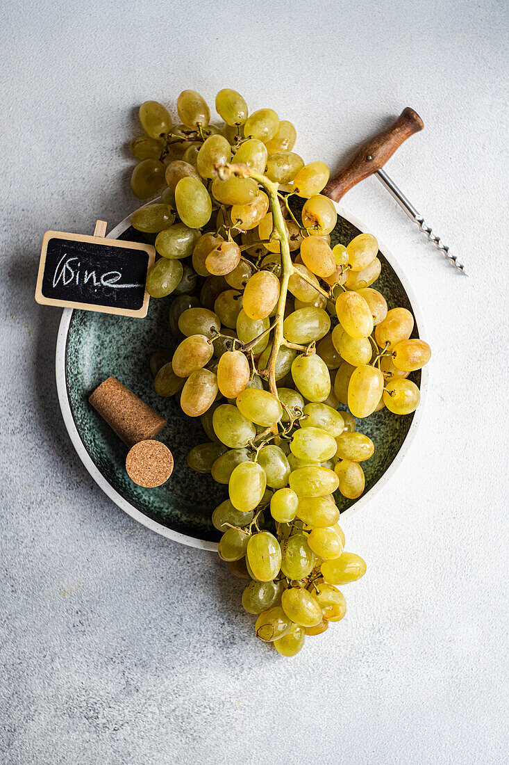 Ripe grapes on the vine on a plate