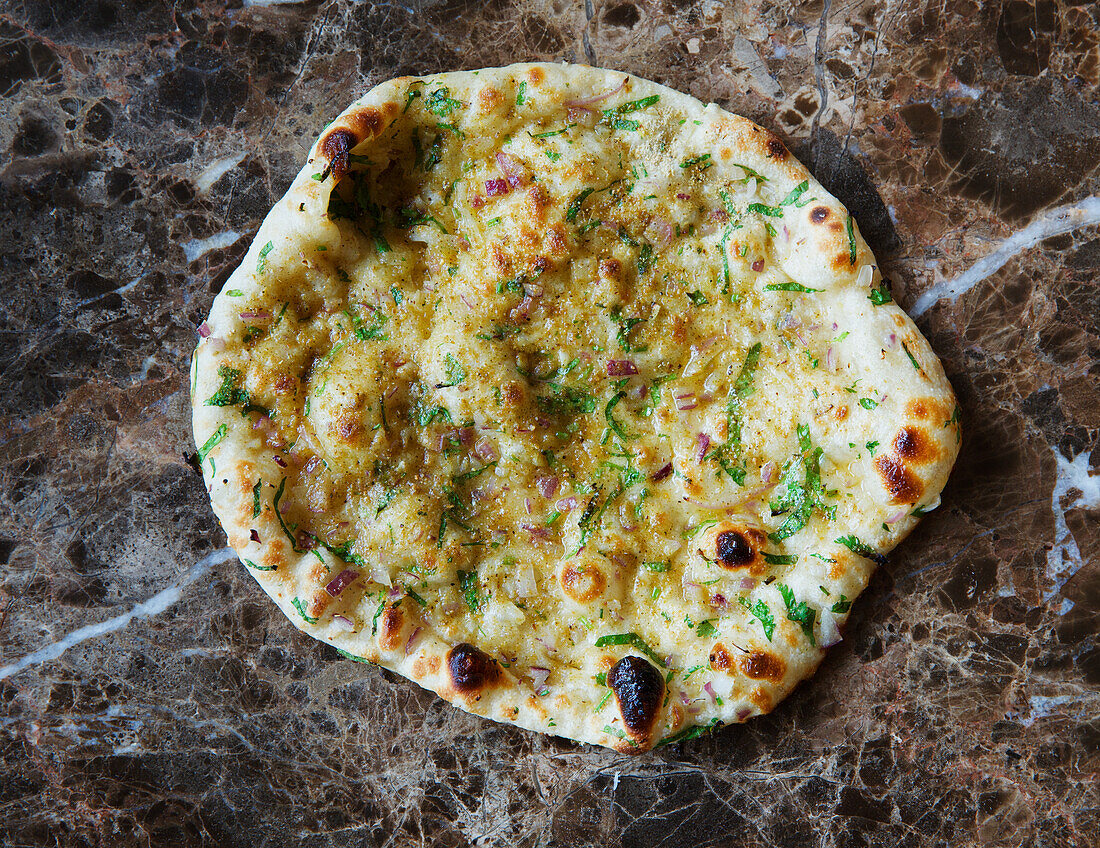 Naan bread with spring onions