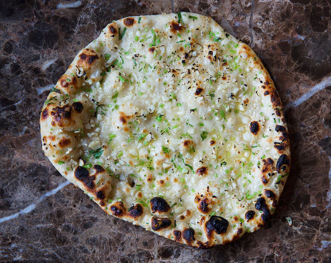 Flatbread with butter and spring onions