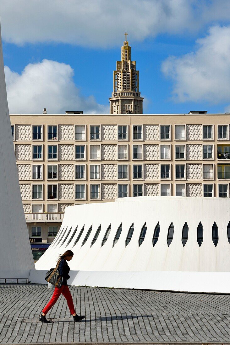 France,Seine Maritime,Le Havre,Downtown rebuilt by Auguste Perret listed as World Heritage by UNESCO,the little volcano library artwork by architect Oscar Niemeyer,the St. Joseph's Church in the background