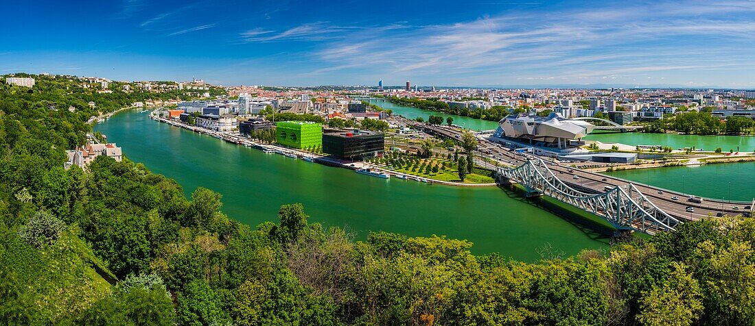 France,Rhône (69),Lyon,district of La Confluence in the south of the peninsula,first French quarter certified sustainable by the WWF,view on the railway and road bridges of the Mulatiere,the Museum of Confluences,museum of sciences and companies,located at the confluence of the Rhone and Saone,the quai Rambaud along the old docks with the Green Cube and Orange Cube,Notre Dame de Fourviere Basilica,the Incity Tower and the Crayon