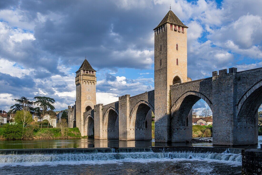 France,Lot,Quercy,Cahors,The Valentre bridge above Lot river,dated 14 th. century,listed as World Heritage by UNESCO
