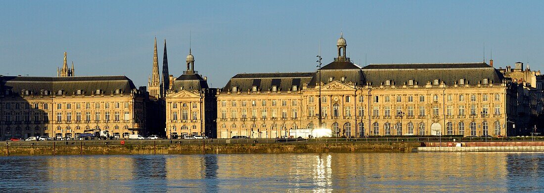 France,Gironde,Bordeaux,area listed as World Heritage by UNESCO,the banks of the Garonne river and the buildings of Bourse square and Saint Andre Cathedral in the background