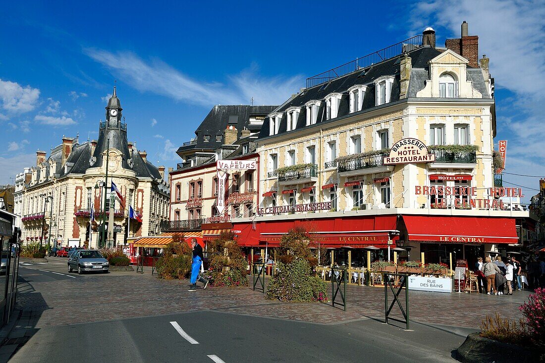 France,Calvados,Pays d'Auge,Trouville sur Mer,Le Central and Les Vapeurs restaurant,the moule frites (mussels and fries) are their specialty,the town hall in the background