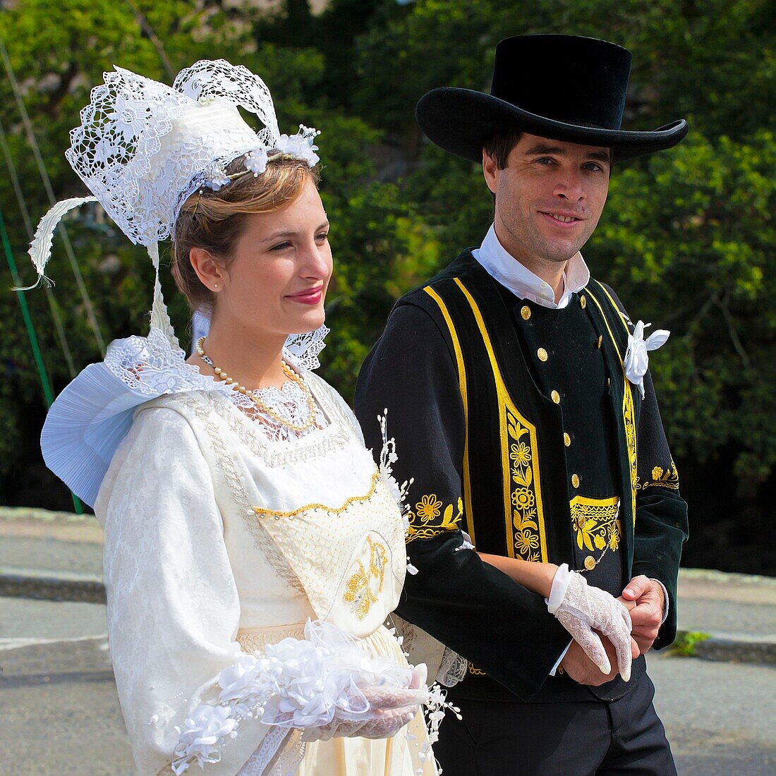 France,Finistere,parade of the 2015 Gorse Flower Festival in Pont Aven,Pont Aven bride's costume and Elliant's costume