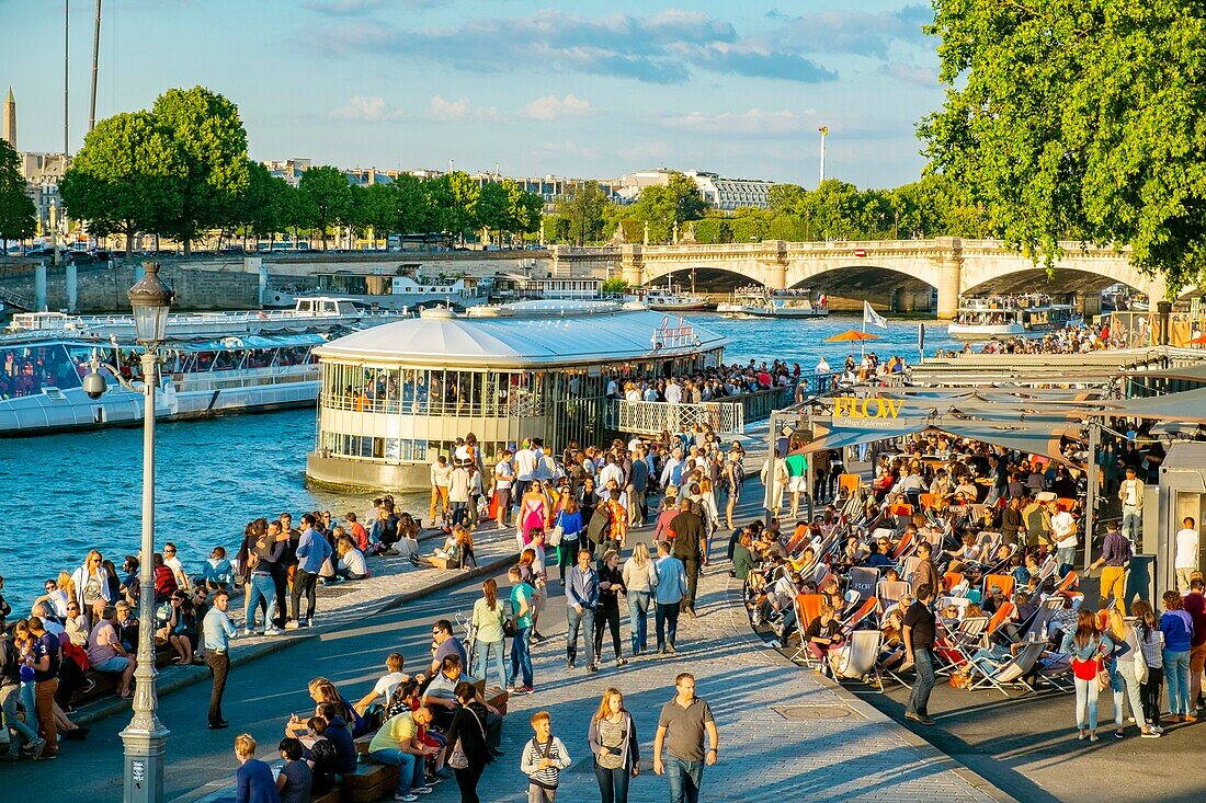 France,Paris,area listed as World Heritage by UNESCO,the banks of the Seine,the Nouvelles Berges on summer nights and the houseboat Rosa Bonheur