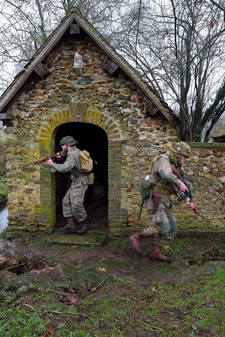 France,Eure,old wash-house of Sainte Colombe prés Vernon,Allied Reconstitution Group (US World War 2 and french Maquis historical reconstruction Association),reenactors in uniform of the 101st US Airborne Division