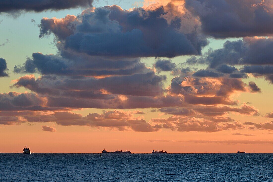 France,Seine Maritime,Le Havre,cargo ships anchored in the Le Havre port waiting area off the coast