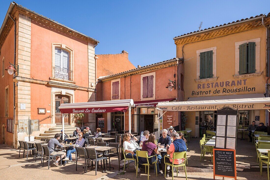 France,Vaucluse,regional natural park of Luberon,Roussillon,labeled the most beautiful villages of France,town hall square