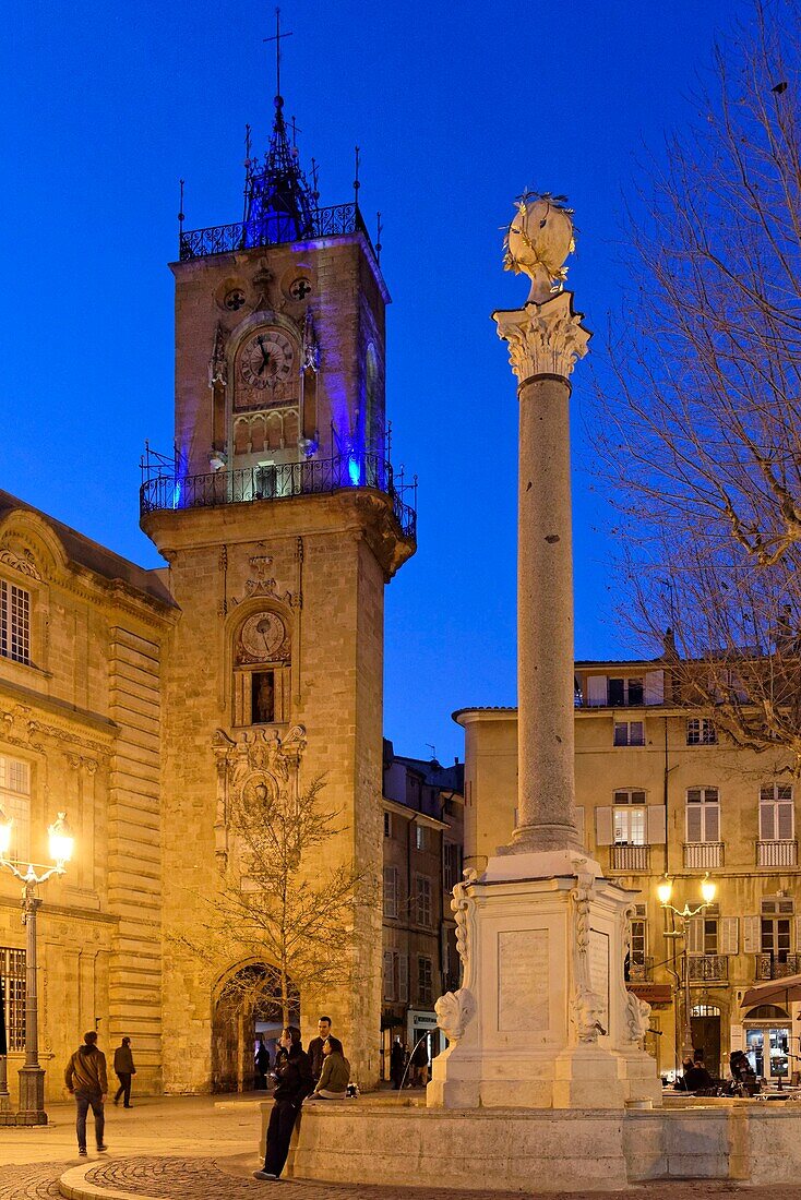 France,Bouches du Rhone,Aix en Provence,Place de l'Hotel de Ville (City Hall square),Fountain of the tanners and the bell tower of the Augustins