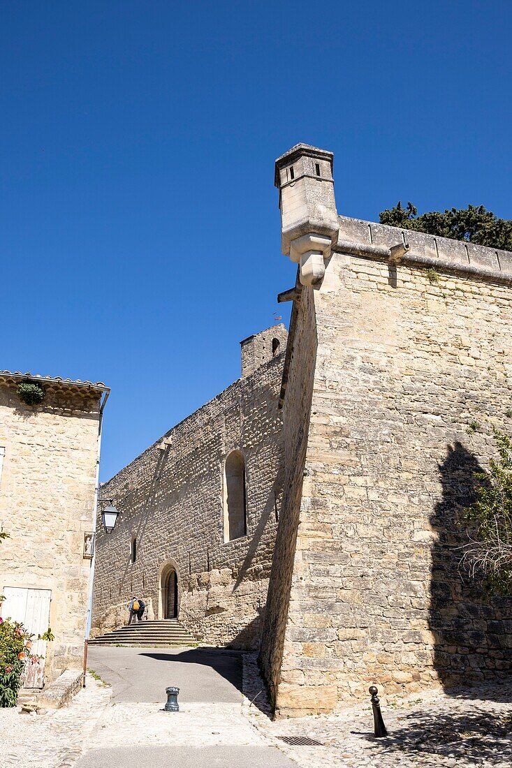 France,Vaucluse,Regional Natural Park of Luberon,Ansouis,labeled the Most beautiful Villages of France,bartizan and ramparts of the castle of the seventeenth century,St Martin church