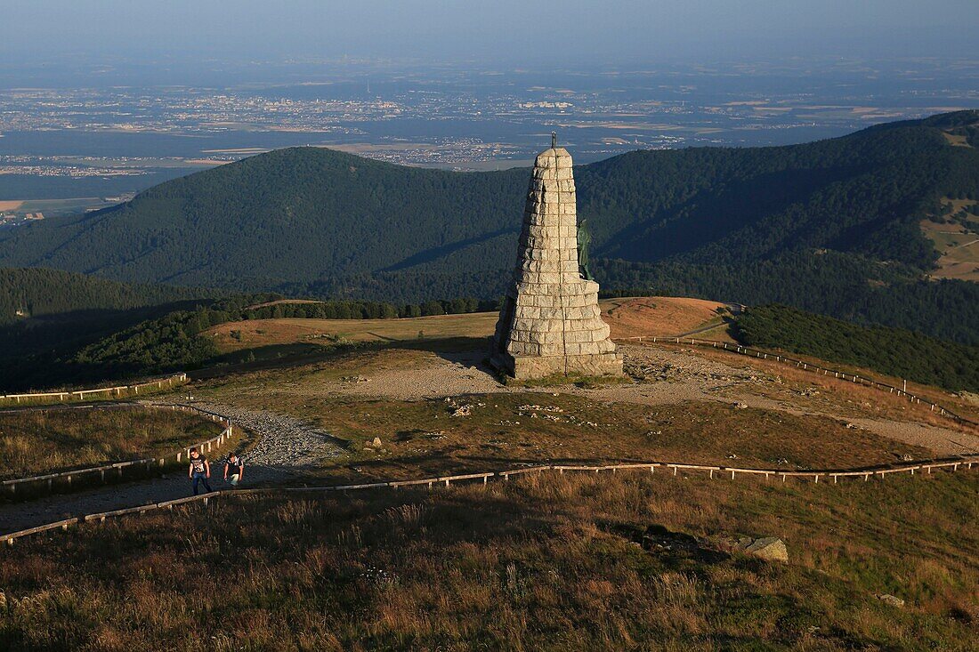 France,Haut Rhin,Guebwiller,hikers around the monument of blue devils at the top of the Grand Ballon de Guebwiller