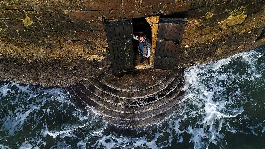 France,Gironde,Verdon sur Mer,rocky plateau of Cordouan,lighthouse of Cordouan,listed as Monument Historique,access door closed during high tides