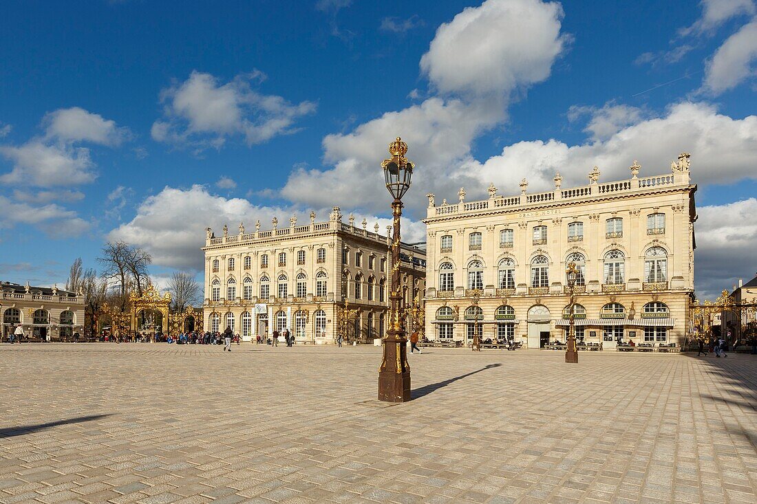 France,Meurthe et Moselle,Nancy,Stanislas square (former royal square) built by Stanislas Leszczynski,king of Poland and last duke of Lorraine in the 18th century,listed as World Heritage by UNESCO,facades of the Grand Hotel de la Reine and the Opera house,street lamps and railings iron works by Jean Lamour,Amphitrite founain (1751) by Barthelemy Guibal
