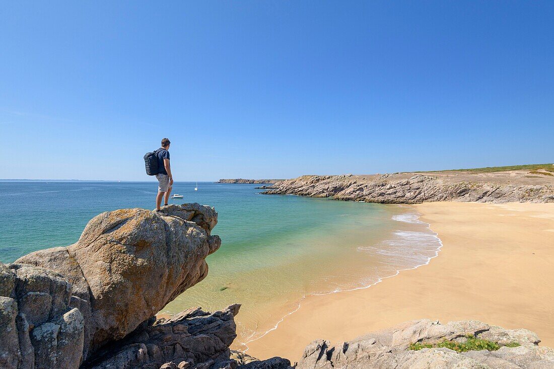 France,Morbihan,Houat,cote ouest,hiker in front of the beach of Portz Plouz