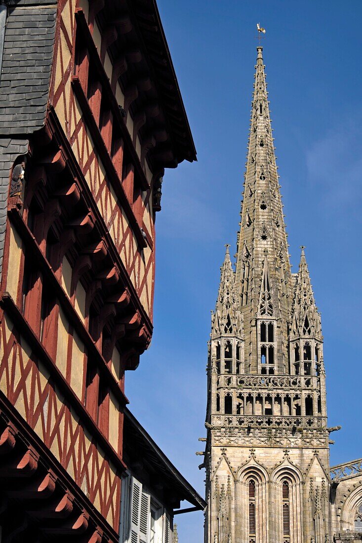 France,Finistere,Quimper,Rue Kereon,half-timbered house,Saint Corentin cathedral dated 13th century,tower,equestrian statue of King Gradlon