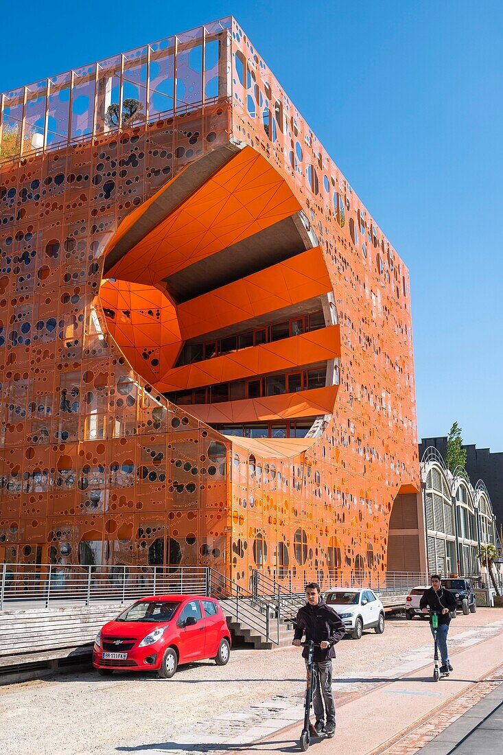 France,Rhone,Lyon,La Confluence district south of the Presqu'ile,close to the confluence of the Rhone and the Saone rivers,quai Rambaud along the former docks,Pavillon des Salins also called Cube Orange by the architects Dominique Jakob and Brendan Mac Farlane