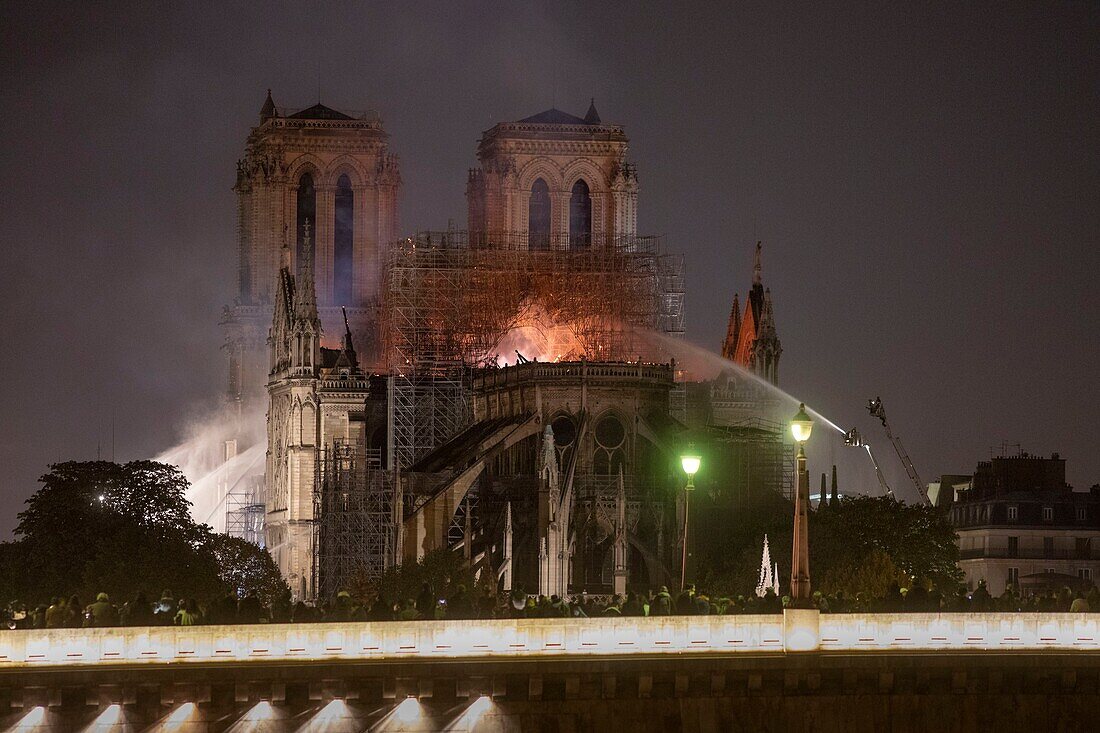 France,Paris,area listed as World Heritage by UNESCO,Ile de la Cite,Notre-Dame Cathedral during the fire of 15/04/2019