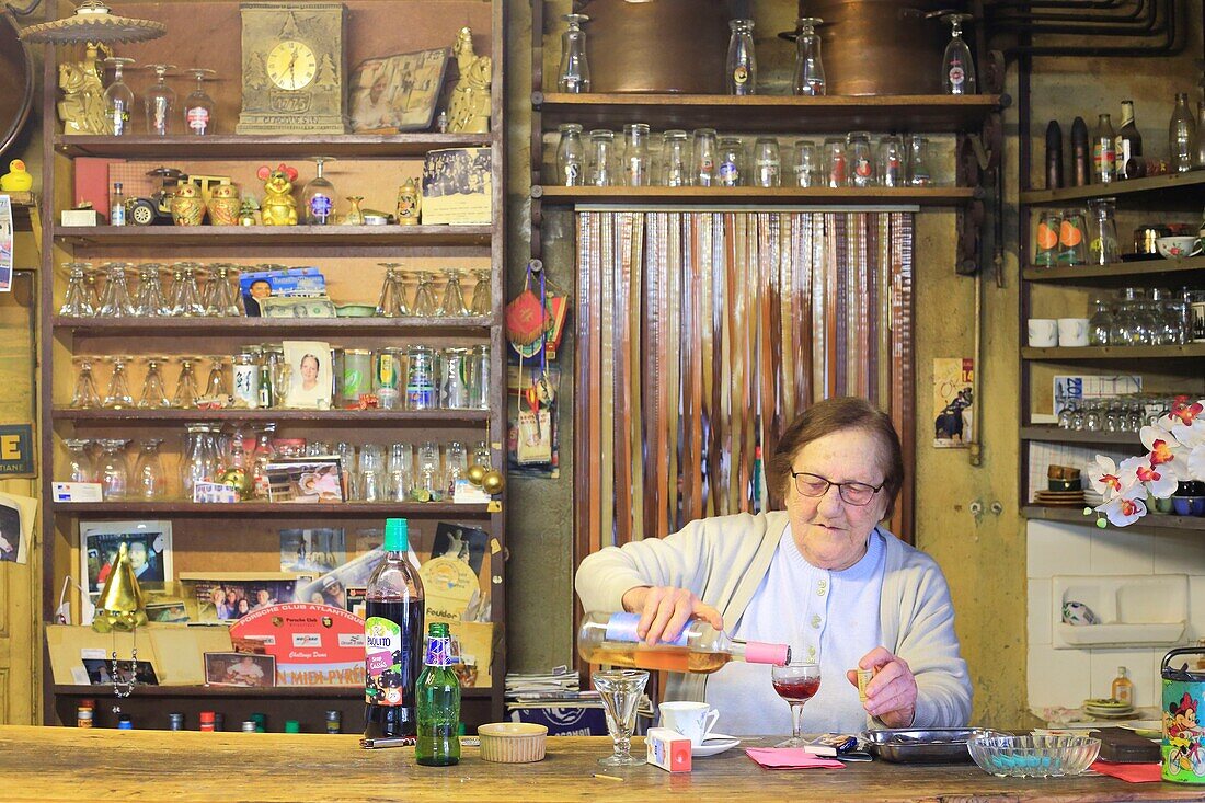 France,Landes,Labastide d'Armagnac,Tortore cafe opened in 1885 (the oldest cafe in France) run by Colette Tortore (here behind the counter)