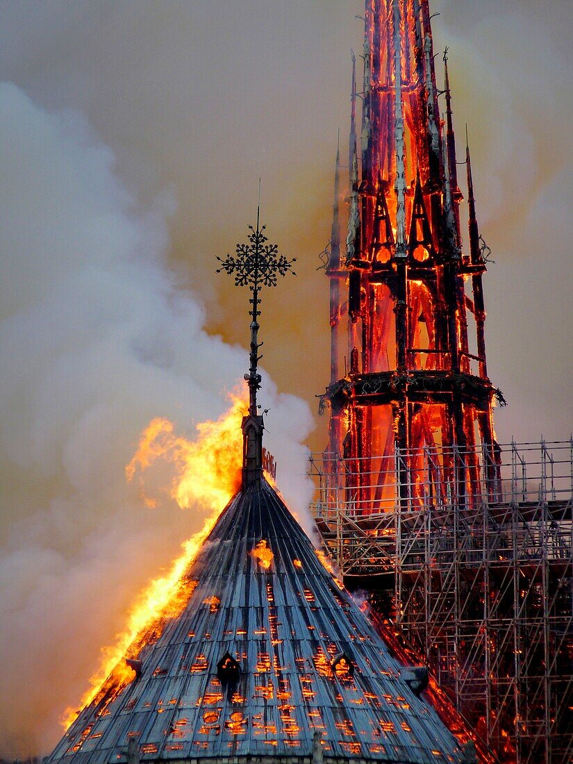 [ Unpublished - Exclusive ] France,Paris,area listed as World Heritage by UNESCO,Notre Dame Cathedral of 14th century Gothic architecture during the fire of 15th April 2019,close-up on the incandescent frame