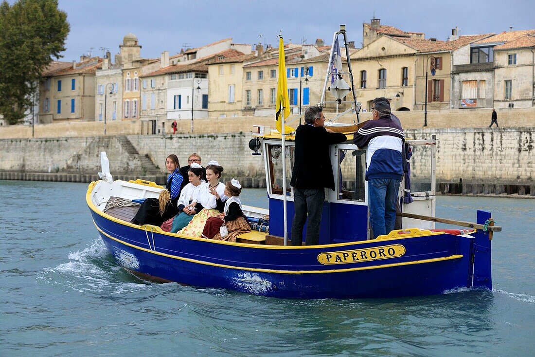 France,Bouches du Rhone,Arles,district of Trinquetaille,first day of rice,arrival of Marine Arnaud ambassador of rice boat on the Rhone