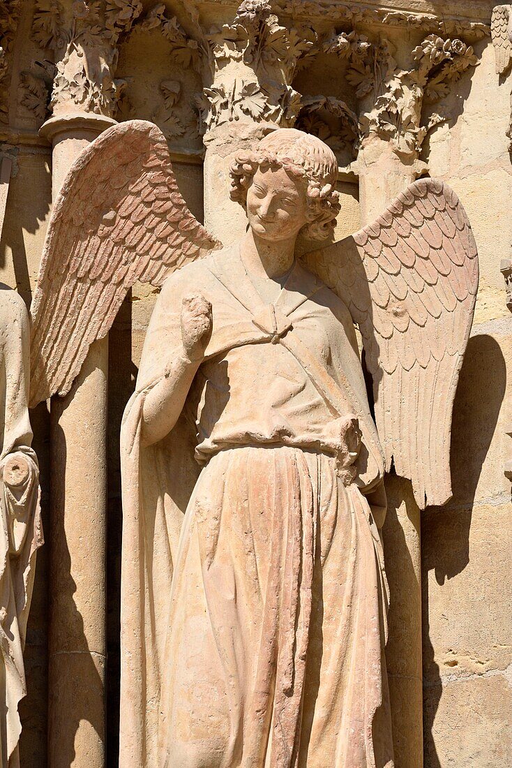 France,Marne,Reims,Notre Dame cathedral,angel with a smile carved between 1236 and 1245 and located at the north left portal