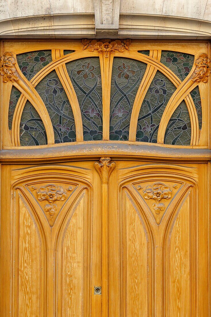 France,Meurthe et Moselle,Nancy,detail of an Art Nouveau door in Avenue Foch,house of chief inspector of rivers and forests Fernand Loppiret built in 1902 by architect Charles Desire Bourgon,sculpture by Auguste Vautrin,building listed as Ecole de Nancy (school of Nancy)