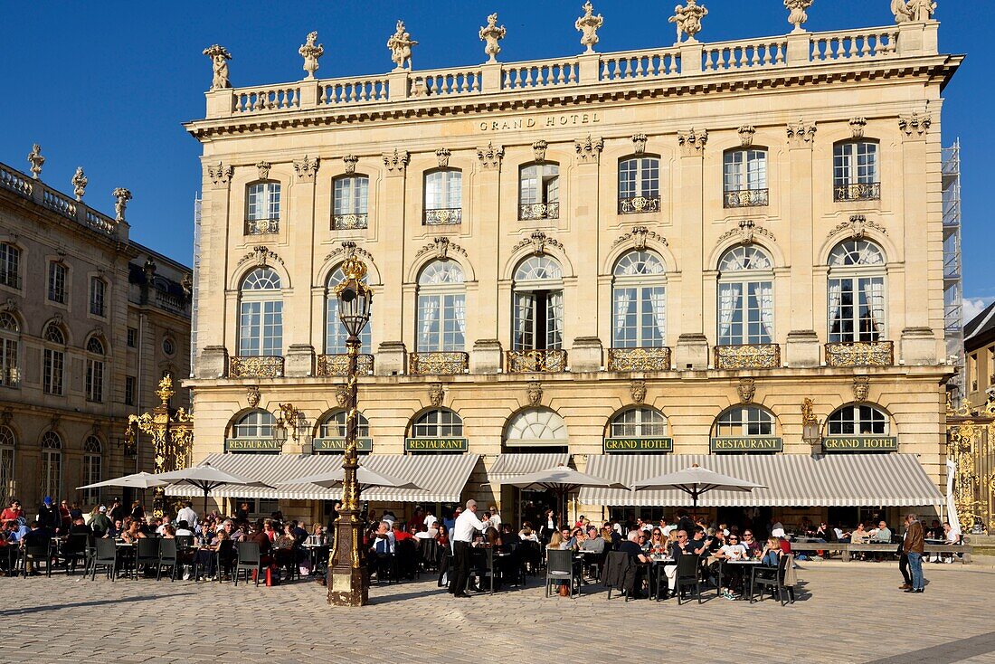 France,Meurthe and Moselle,Nancy,place Stanislas (former Place Royale) built by Stanislas Leszczynski,king of Poland and last duke of Lorraine in the eighteenth century,classified World Heritage of UNESCO,terrace of the hotel cafe Le Grand Hôtel