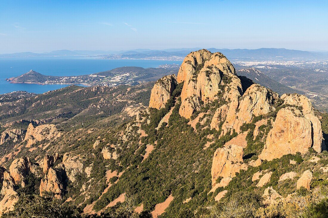 France,Var,Agay commune of Saint Raphael,Esterel massif seen from Cap Roux on the summit of Saint Pilon (442m),the coastline of the Corniche de l'Esterel and in the background Agay and Cap du Dramont