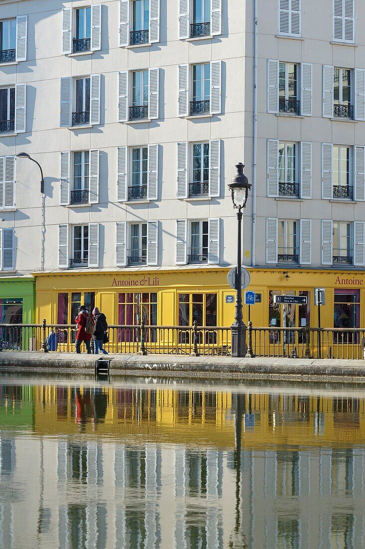 France,Paris,Saint Martin canal,Antoine et Lili shop window and apartment building on Quai de Valmy