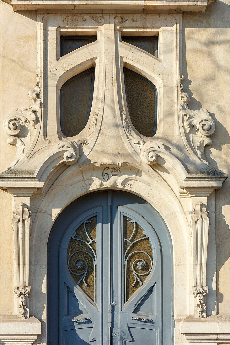 France,Meurthe et Moselle,Nancy,door of Miss Geschwindammer (1905) by architects Henri Gutton and Joseph Hornecker,sculptures by Leopold Wolff in Art Nouveau Ecole de Nancy style n Quai de la Bataille