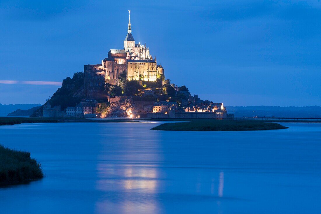 France,Manche,Mont Saint Michel Bay listed as World Heritage by UNESCO,Abbey of Mont Saint Michel and River Couesnon,night