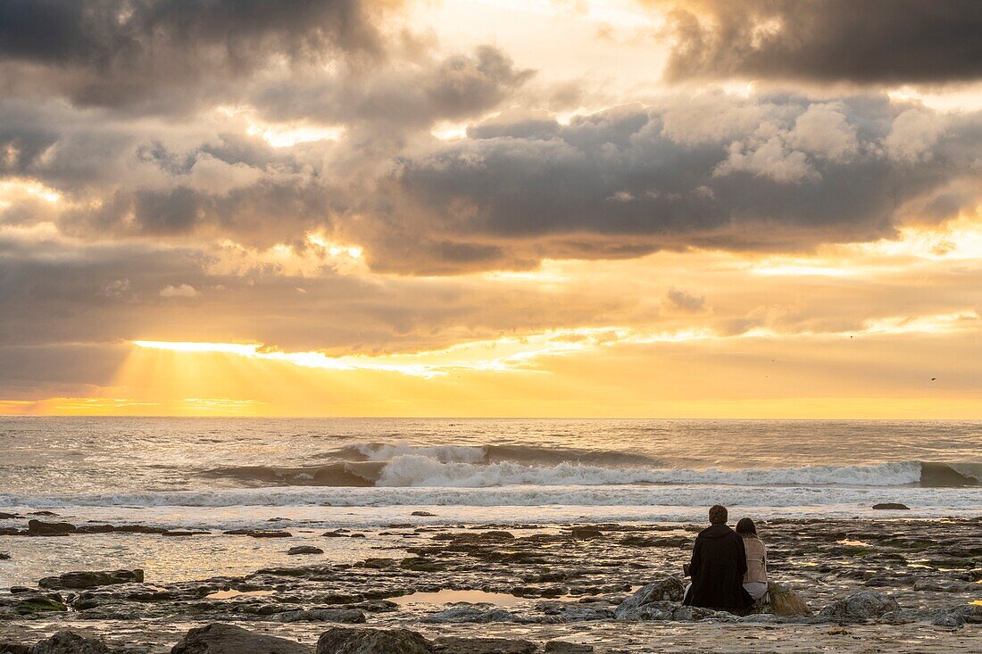 France,Pas de Calais,Opal Coast,Ambleteuse,a loving couple facing the sunset