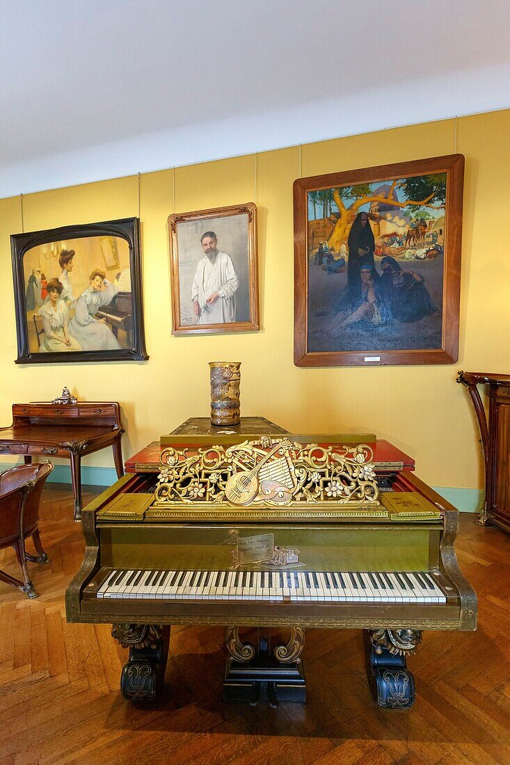 France,Meurthe et Moselle,Nancy,Ecole de Nancy (Nancy school) museum in the house that belonged to Antoine Corbin dedicated to Art Nouveau,piano by Auguste Majorelle father of Louis Majorelle decorated by Louis Majorelle,paintings by Jacques Majorelle,Louis Majorelle's son