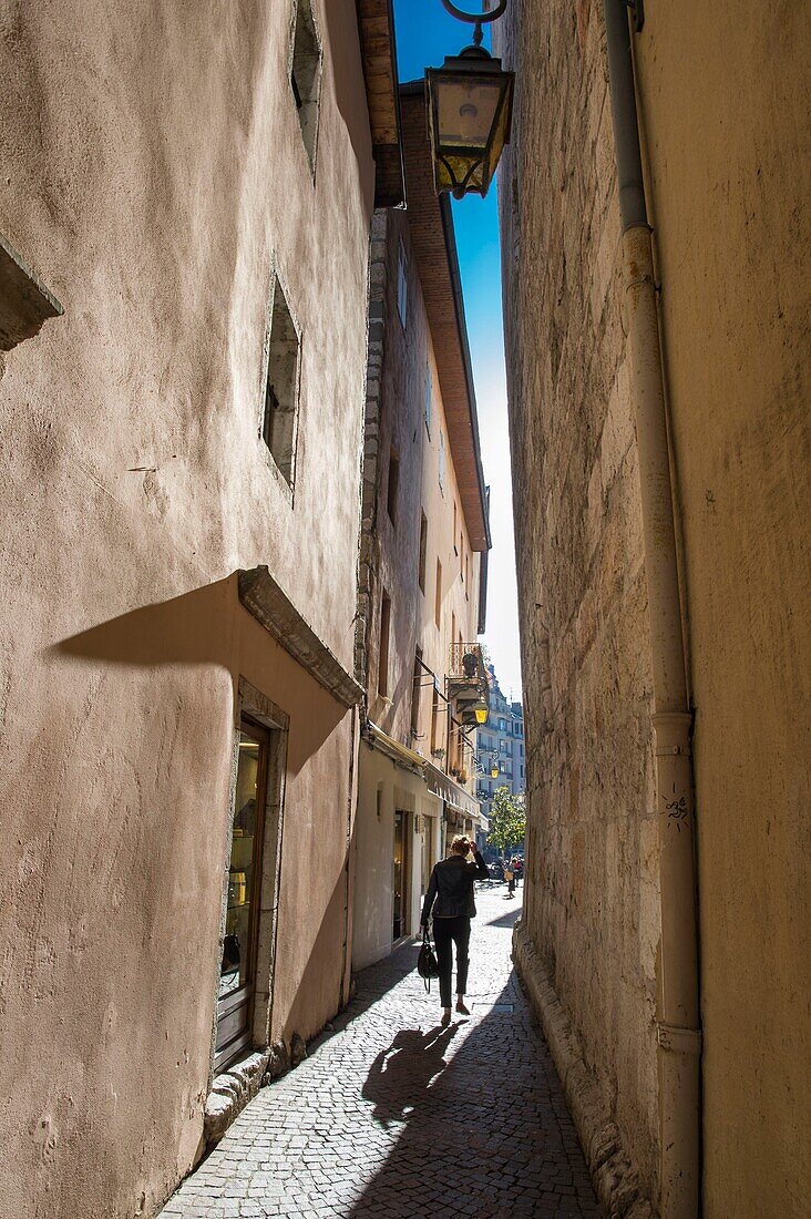 France,Haute Savoie,Annecy,in the old town,silhouette in the narrow passage Notre Dame