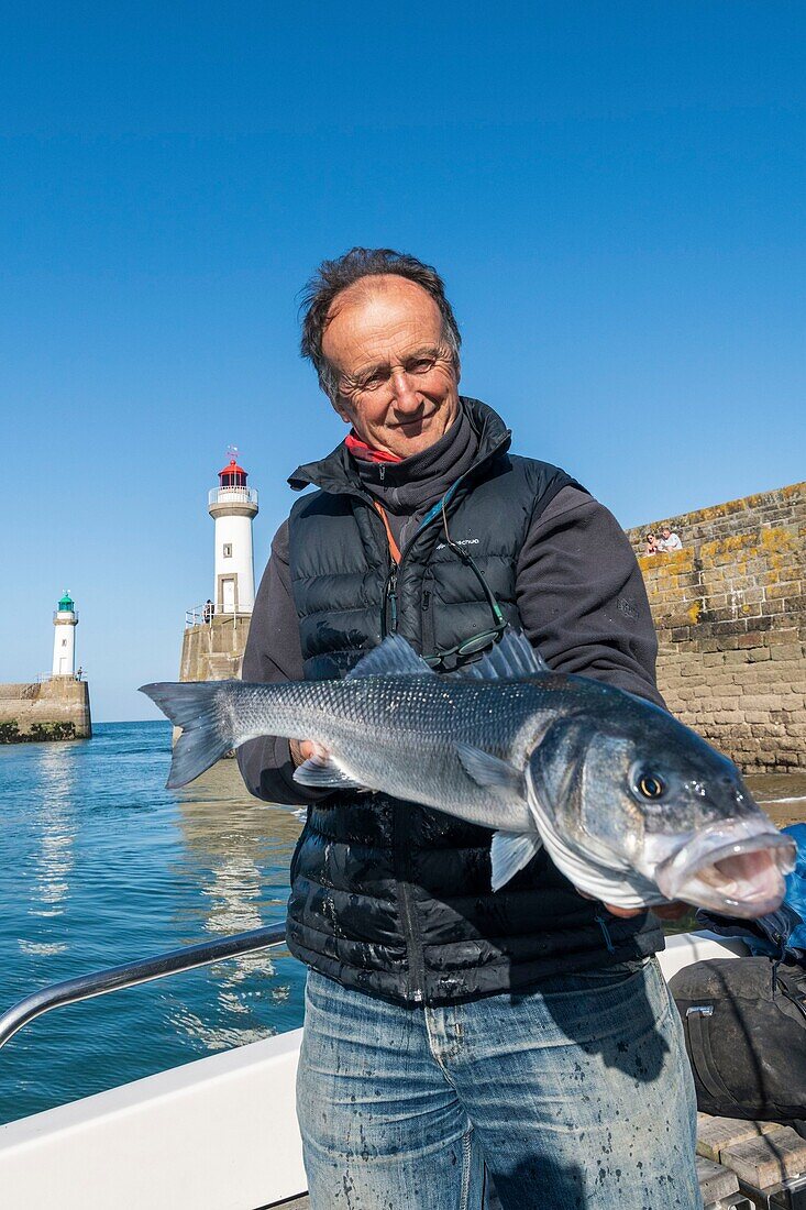 France,Morbihan,Belle-Ile island,le Palais,fishing guide and instructor Arnaud de Wildenberg returning to port